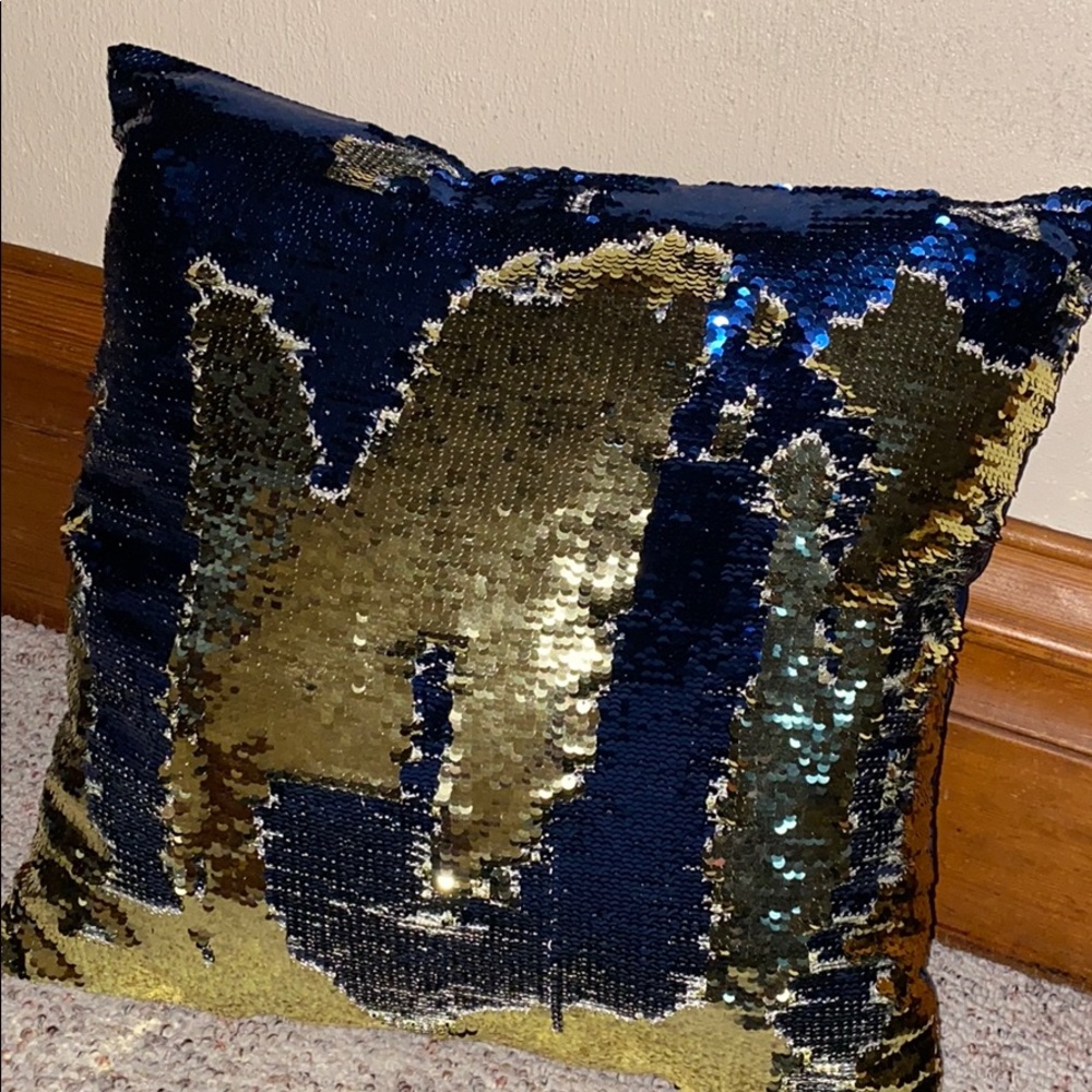 Blue and gold sequined pillow